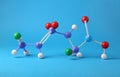 Structure of molecule on blue background. Chemical model