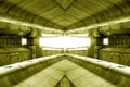Structure of public building similar to futuristic terminal of spaceship station interior in yellow light. modern inspiration of Royalty Free Stock Photo