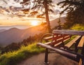 Wooden bench on the top of the mountain with sunset and beautiful view Royalty Free Stock Photo