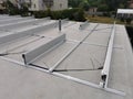 The structure on the roof for installing solar panels was built using a non-invasive method Royalty Free Stock Photo