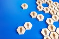 The structure of a society made of hexagons. The process of uniting or disintegrating people into a single group, a social process Royalty Free Stock Photo