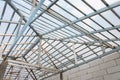 Structure of steel roof frame for home construction. Concept of residential building under construction Royalty Free Stock Photo