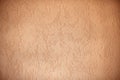 structured wall surface with dark edges, apricot colored background design Royalty Free Stock Photo