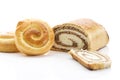 Strudel filled with nuts buns filled with cream on white background