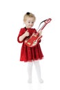 Strumming Her Toy Guitar Royalty Free Stock Photo