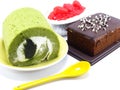 Strwberry cheesecake green tea roll cake and chocolate cake on white background Royalty Free Stock Photo