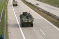 Stryker,wheeled armored vehicle drives on highway . Royalty Free Stock Photo