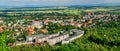 Strzegom, view of the city from the viewpoint on the top of Krzyzowa Mountain. Vast landscape for urban buildings with mountains