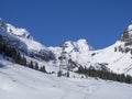 Stubai Glacier, Austria, May 2, 2019: Snow covered slopes with modern big orange Cable cars in Mountains ski resort at