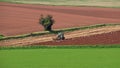 Stubble being turned into the earth on a Devon farm UK