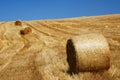 Stubble field and straw bales Royalty Free Stock Photo