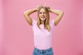 Stubborn girl never let down on dreams. Charming excited and carefree optimistic young woman with tan and fair hair Royalty Free Stock Photo