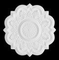 Stucco moulding rosette, isolated on black