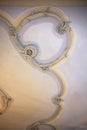 Stucco ornament. Ornamental background. Classicist architecture detail. Baroque ornamental ceiling.