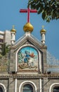 Stucco relief work Saint George on horse slaying a dragon vector Syrin Catholic Church Royalty Free Stock Photo