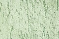 Stucco texture, rough ragged plaster background, scratched crack Royalty Free Stock Photo