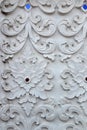 Stucco white sculpture decorative pattern wall design square format.