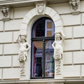 stucco work of town houses from the late 19th century