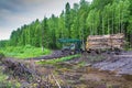 Stuck log truck loaded with logs. Royalty Free Stock Photo