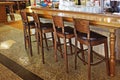 Studded brown bar stool