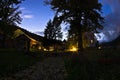 Studenica monastery yard during evening prayer Royalty Free Stock Photo