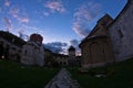 Studenica monastery yard during evening prayer Royalty Free Stock Photo