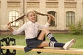 Student adorable child in formal uniform relaxing outdoors. Pleasant minutes of rest. Time to relax and have fun Royalty Free Stock Photo