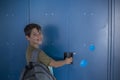 Student and blue school lockers Royalty Free Stock Photo