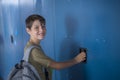 Student and blue school lockers Royalty Free Stock Photo