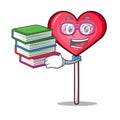 Student with book heart lollipop mascot cartoon