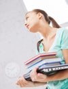 Student with books, computer and folders Royalty Free Stock Photo