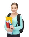 Student with books and schoolbag Royalty Free Stock Photo