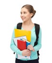 Student with books and schoolbag Royalty Free Stock Photo