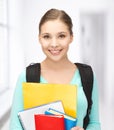 Student with books and schoolbag Royalty Free Stock Photo