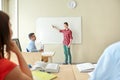 Student boy at school white board and teacher Royalty Free Stock Photo