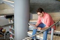 Student boy or young man reading book at library Royalty Free Stock Photo