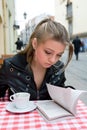 The student in cafe street in old city Royalty Free Stock Photo