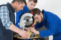 Student in carpentry class using circular saw Royalty Free Stock Photo