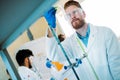 Handsome student of chemistry working with chemicals Royalty Free Stock Photo