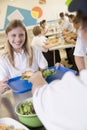 A student collecting lunch in school cafeteria Royalty Free Stock Photo