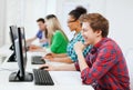 Student with computer studying at school