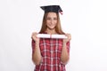 Student with diploma and graduation cap Royalty Free Stock Photo