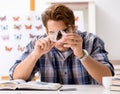 Student entomologist studying new species of butterflies Royalty Free Stock Photo