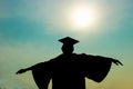 Student extending the arms when Celebration Education Graduation Royalty Free Stock Photo