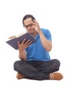 Student With Eye Sight Problem, Hard to Read a Book Royalty Free Stock Photo