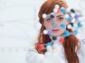Student face analyzing molecule Royalty Free Stock Photo