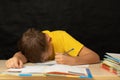 The student fell asleep at the table during the lesson