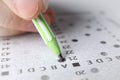 Student fills answers test sheet