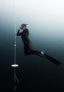 Student freediver learns presure equalization