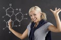 Student girl at blackboard Royalty Free Stock Photo